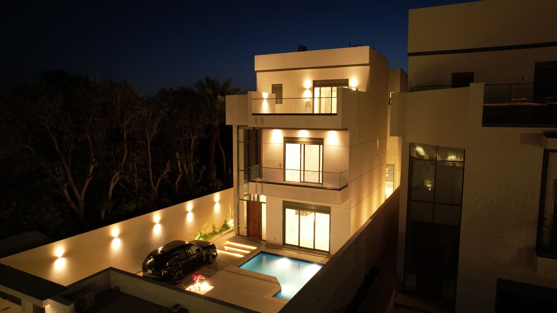 Façade at night — Private Villa, Al Murjan