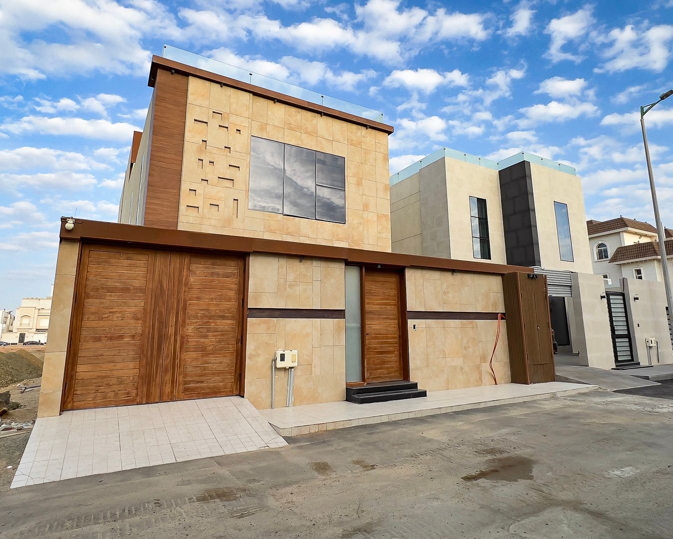 Exterior — Timber-Detailed Villa, Al Mohammadiyah