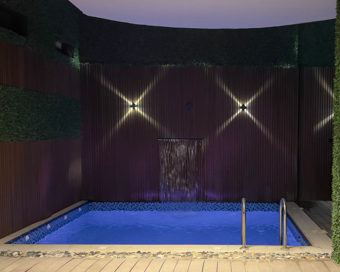 Pool at night — Timber-Detailed Villa, Al Mohammadiyah