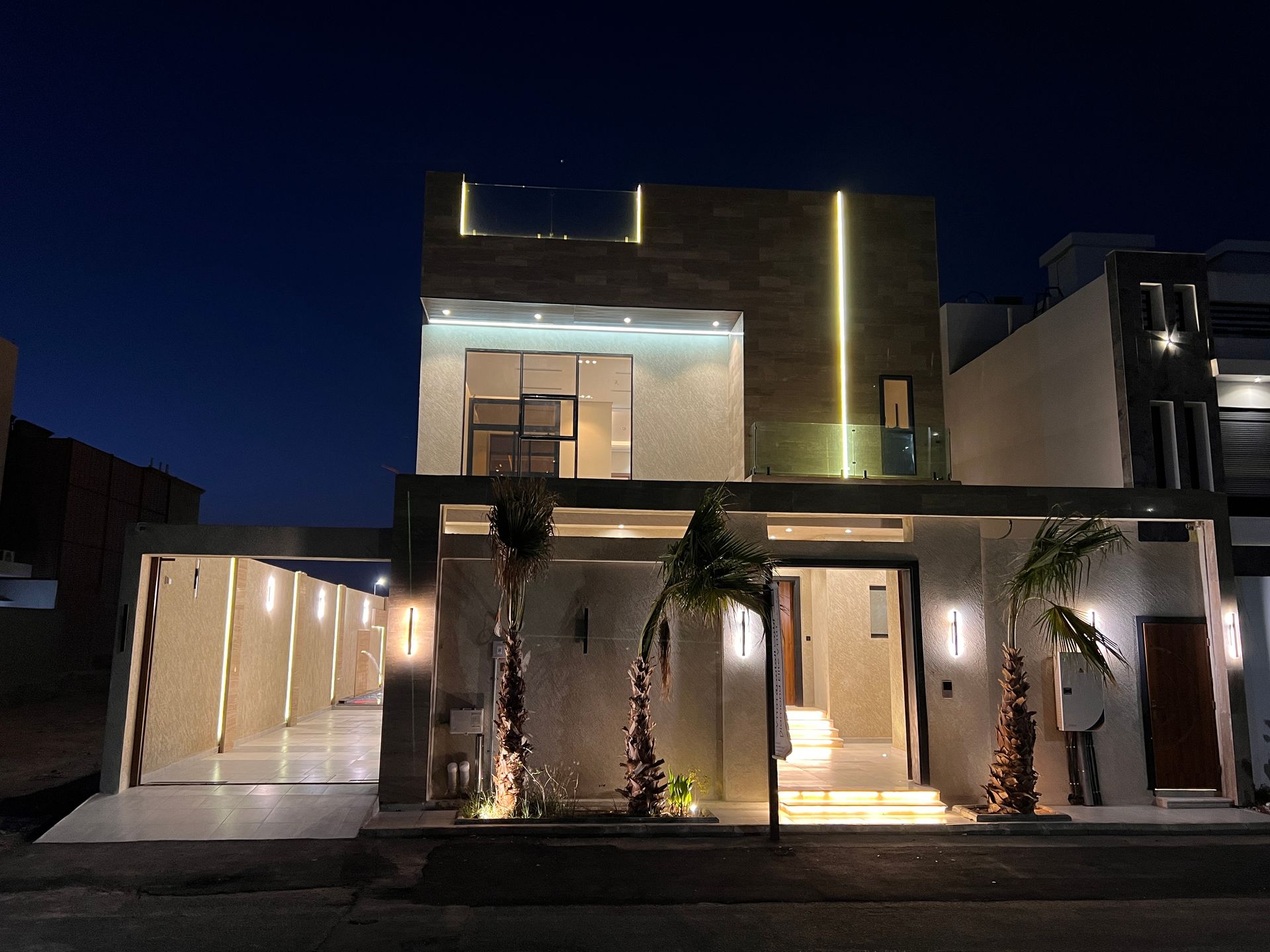 Façade at night — Garden-Facing Villa, Al Shera'a, North Obhur