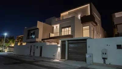 Façade at night — Villa for Rent, Al Murjan
