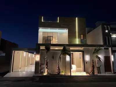 Façade at night — Garden-Facing Villa, Al Shera'a, North Obhur