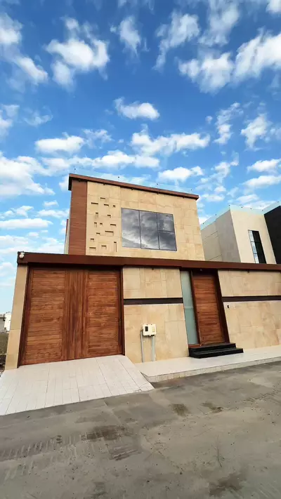 Exterior — Timber-Detailed Villa, Al Mohammadiyah