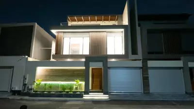 Façade at night — Contemporary Villa, Al Khalidiyah