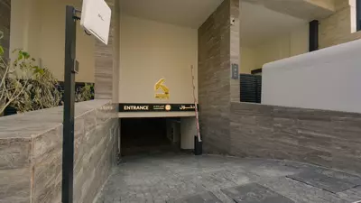 Illustrative — developer's finished unit at Kian Al-Masiah — Building 115, Al Rayyan: Entrance — Front-Facing Two-Bedroom Apartment, Building 115, Al Rayyan